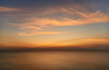 Fototapeta na wymiar sunset over the sea, clouds, skyline 