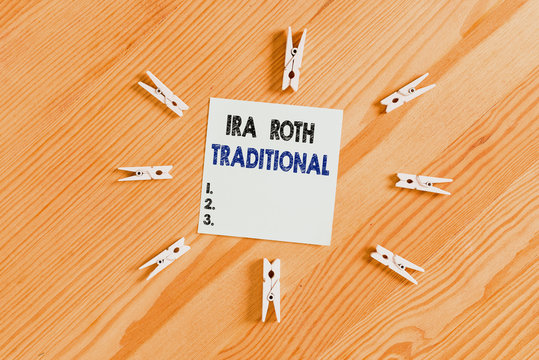 Word writing text Ira Roth Traditional. Business photo showcasing are tax deductible on both state and federal Colored clothespin papers empty reminder wooden floor background office