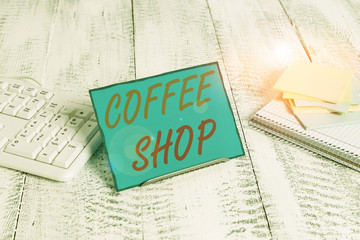 Word writing text Coffee Shop. Business photo showcasing small informal restaurant serving coffee...
