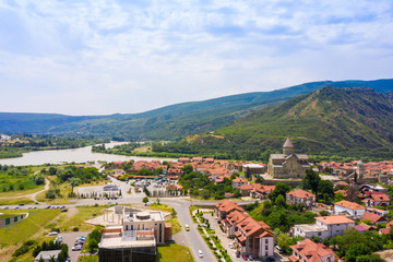 Panoramic view of Mtskheta, The Old Town Lies At The Confluence Of The Rivers Mtkvari And Aragvi. Svetitskhoveli Cathedral, Ancient Georgian Orthodox Church, Unesco Heritage In The Center.