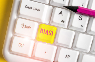 Conceptual hand writing showing Bias. Concept meaning inclination or prejudice for or against one...