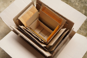 Recycle cardboard box in different size stack in multiple layer for reuse , collected from online...