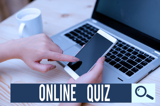 Writing Note Showing Online Quiz. Business Concept For Game Or A Mind Sport That Are Published On The Internet Woman With Laptop Smartphone And Office Supplies Technology