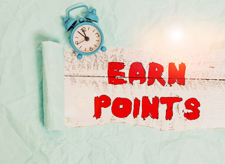 Conceptual hand writing showing Earn Points. Concept meaning to get praise or approval for...