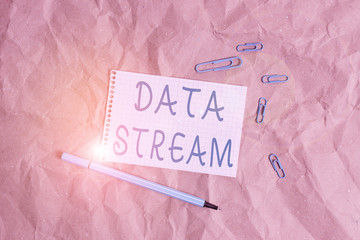 Writing note showing Data Stream. Business concept for sequence of digitally encoded coherent signals used to transmit Papercraft desk square spiral notebook office study supplies