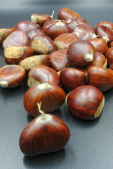 chestnuts isolated on black background
