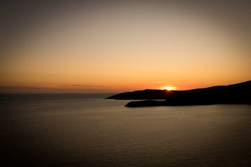 Fototapeta premium Colorful ocean sunset with the setting sun. Seascape at sunset.