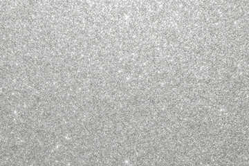 Silver glitter background texture white sparkling shiny wrapping paper for Christmas holiday...