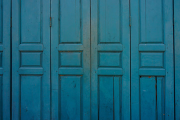 Old style turquoise wooden doors