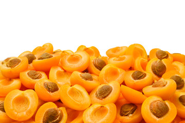 Ripe juicy orange apricots slices isolated on white background. Space for text or design.