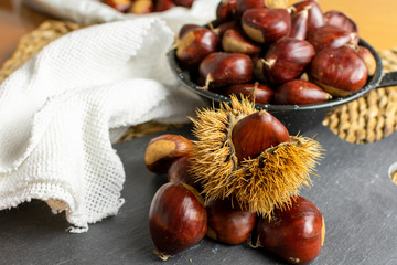 roasted chestnuts rag white black table stone