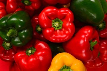 Fresh red, green, yellow bell pepper background.