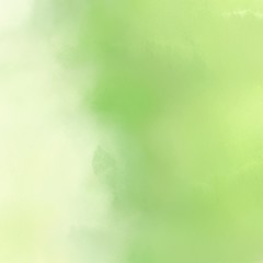 square graphic format light green, light golden rod yellow and tea green color painted background. broadly painted backdrop can be used as texture, background element or wallpaper