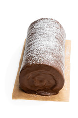 Chocolate yule log christmas cake coated with milk chocolate isolated on white