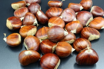 chestnuts isolated on black background