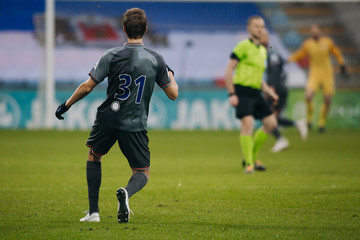 Fototapeta premium Soccer players in action on the stadium