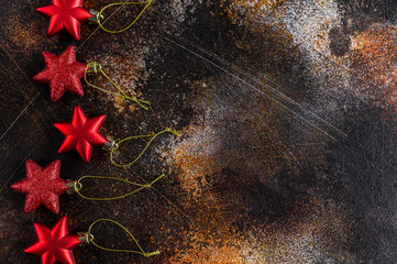 Happy New Year 2020. Christmas background, red stars on dark background. Merry christmas card.  Space for text. Happy New Year 2020. selective focus