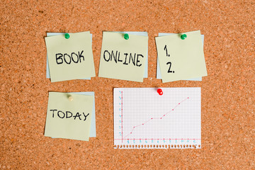 Conceptual hand writing showing Book Online. Concept meaning booklike form that is only available...