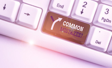 Writing note showing Common Mistakes Question. Business concept for repeat act or judgement...