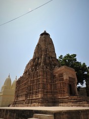 Fototapeta na wymiar Kandariya Mahadeva Temple, Western Group of Temples, Khajuraho, Madhya Pradesh, India. it's an UNESCO world heritage site.