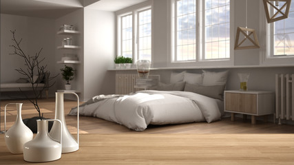 Wooden table top or shelf with minimalistic modern vases over blurred modern bedroom with big panoramic window, double bed and parquet floor, minimalist architecture interior design