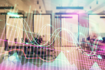 Stock market chart with trading desk bank office interior on background. Double exposure. Concept of financial analysis
