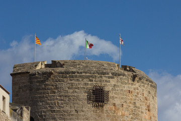 Torre di Porta Terra with three flags - catalan, italian and sar - 301761772