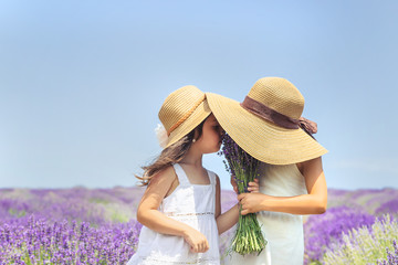 Girl child field of lavender. Selective focus.