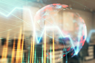 Stock and bond market graph and world map with trading desk bank office interior on background. Multi exposure. Concept of international finance