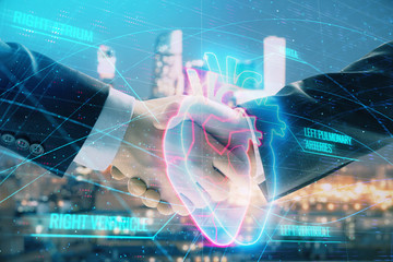 Double exposure of heart drawing on city view background with handshake. Concept of medical education