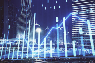 Financial chart on city scape with tall buildings background multi exposure. Analysis concept.