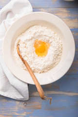 The chef prepares or  making dough for vareniky or pierogi in the kitchen. top view