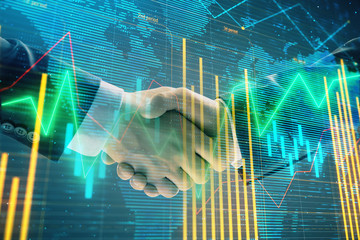 Multi exposure of forex graph and world map on abstract background with two businessmen handshake. Concept of success on international markets