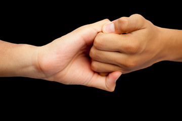 Isolated hands of male teenagers doing Ganesha Yoga Mudra with two hands-on black...