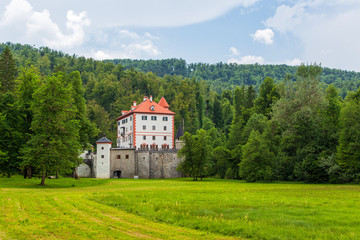 Fototapeta premium Snežnik Castle is a 13th-century castle in the Lož Valley near the settlement of Kozarišče in the municipality of Loška in Slovenia