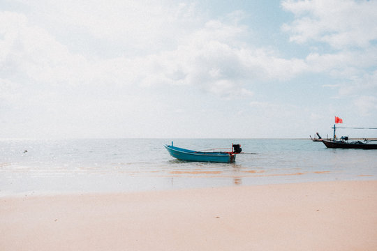 long tail boat on the beach phuket thailand