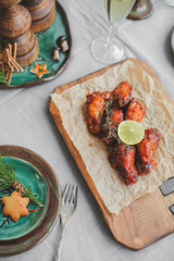 baked chicken for Christmas dinner, festive table setting.