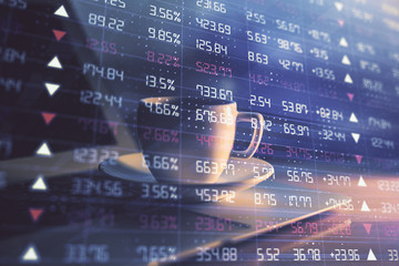 Obraz premium Stock market graph on background with desk and personal computer. Double exposure. Concept of financial analysis.