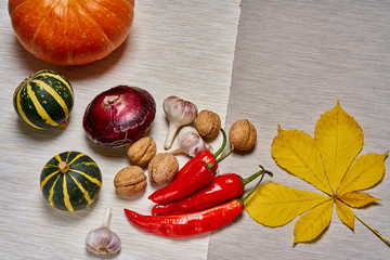 Fresh autumn vegetables lie on the table. Top view and flat lay