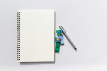 Book opened and pen beside