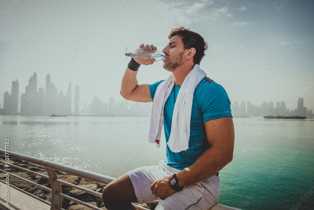 Wall mural Athlete training outdoors