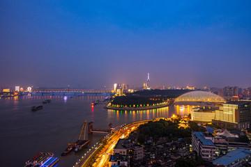 aerial view of  Wuhan city at night.Panoramic skyline and buildings beside yangtze river