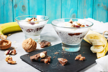 Chia pudding parfait puff with banana, yogurt and nuts