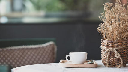 Coffee morning concept, Cup of coffee with hot drink on cafe table.