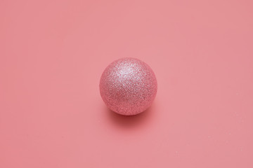Pink background with pink balls. Christmas flay lay. Top view