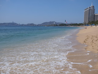 Beach with skyscrapers in ACAPULCO city in Mexico at bay of Pacific Ocean