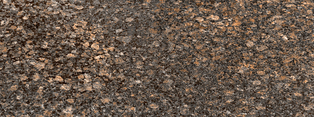 Polished granite as background to any disain. Close up of red marbled granite texture