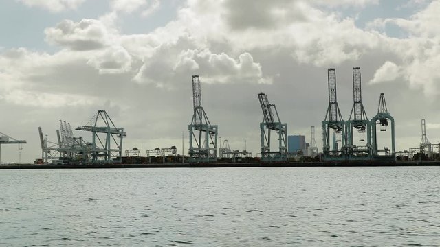 Huge cranes in an industrial port in Rotterdam, gantry cranes of a container cargo terminal