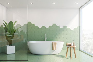Green and white tile bathroom interior, tub - obrazy, fototapety, plakaty