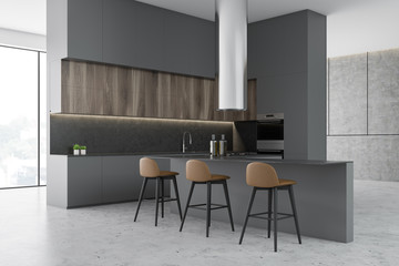 Gray and concrete kitchen corner with bar